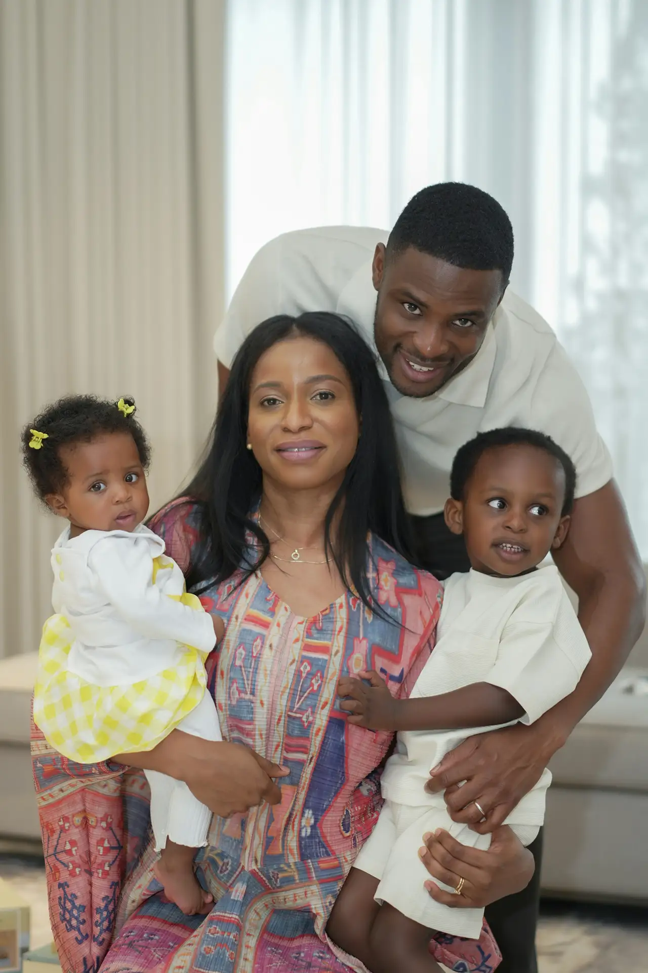 Nigerian family sharing a wellness moment at home